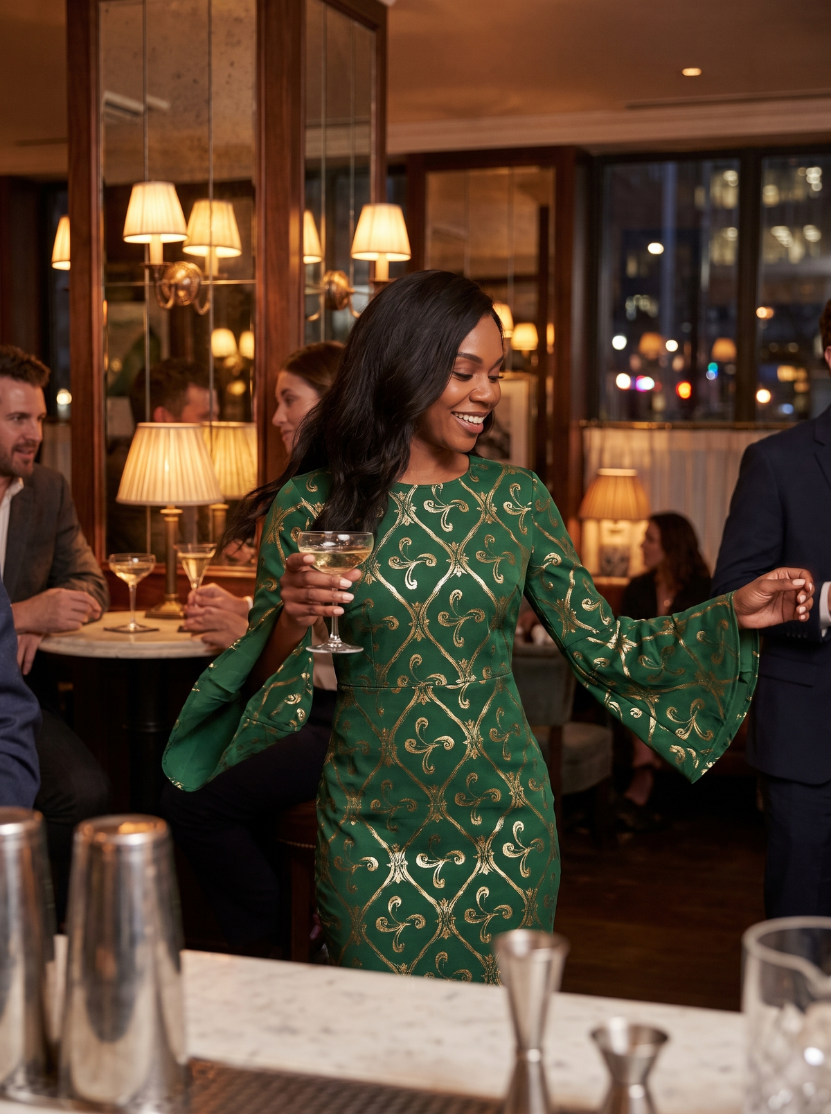 Metallic Swirl Flared Sleeve Dress in a hotel bar