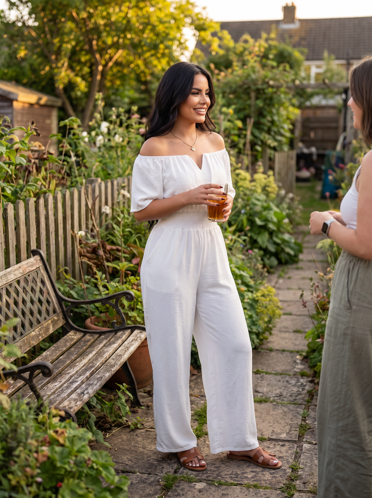 Off Shoulder Shirred Waist Jumpsuit in a garden