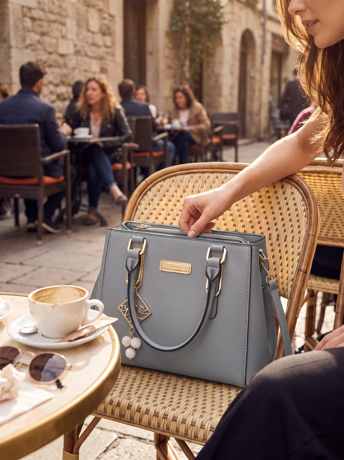 Adjustable Strap Casual Tote Bag at a cafe table